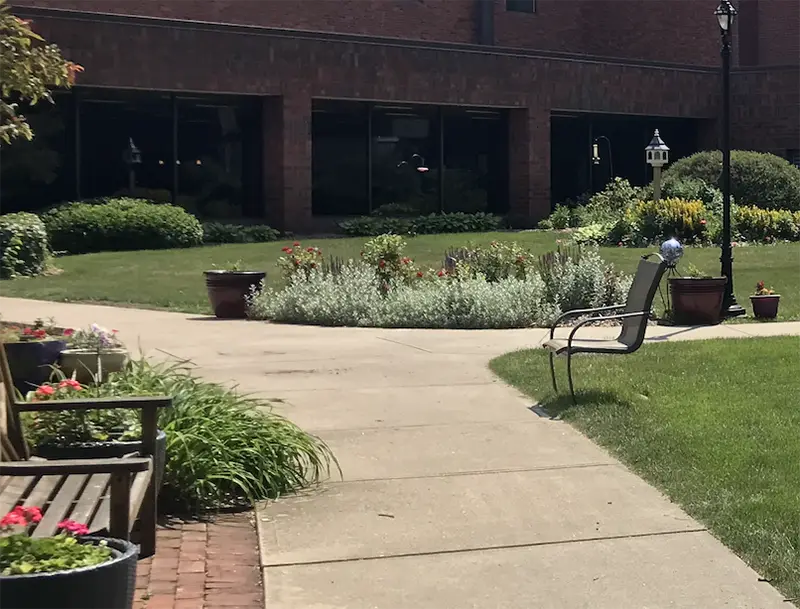 Senior Living concrete raising trip hazard repair in Saginaw